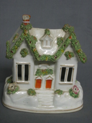 A  19th  Century  Staffordshire  pastel burner  in  the  form  of  a cottage 6" (f)