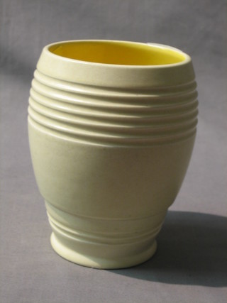 An Art Deco Bretby yellow and cream glazed beaker 5"  together with an Art Pottery jug