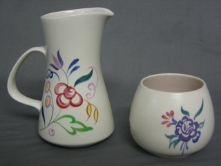 A 1950's Poole Pottery jug base monogrammed LE, 6" together with a circular bowl 3" (2)
