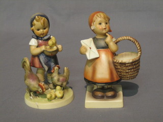 A  Hummel  figure of a standing girl feeding chickens  (f  and  r) and 1 other standing girl with basket and letter