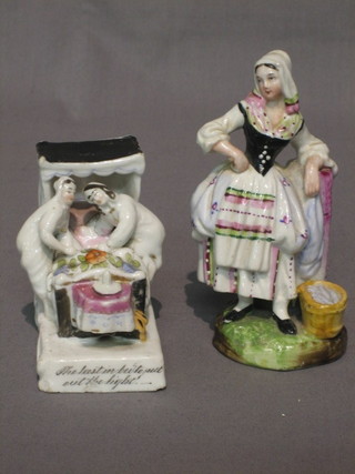 A  19th  Century  fairing "Last Into Bed Puts Out  the  Light"  3" (chips to base) and a 19th Century Continental porcelain figure of  a standing fisher woman 5"