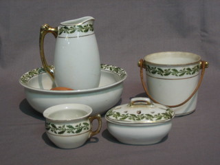A  childs  miniature 5 piece wash set comprising  jug  and  bowl, slop  pail, chamber pot and soap dish, with green  acorn  banding