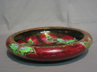 A  Devon  Sylvan  Lustrine Fieldings  red  glazed  pottery  bowl, decorated butterflies 12" (some rubbing)