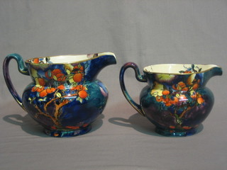 2 graduated S Hancock & Sons Corona Ware Cherry-Ripe pattern jugs 12" and 6", hand painted by Molly Hancock