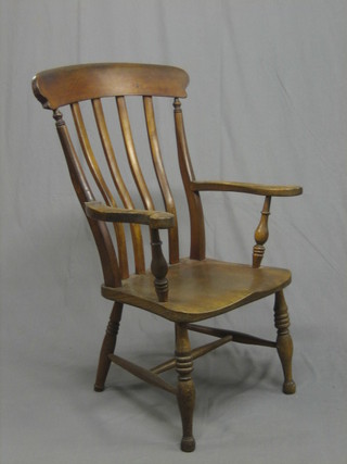 A  19th Century elm stick and rail back kitchen carver chair  with solid elm seat (requires some attention)