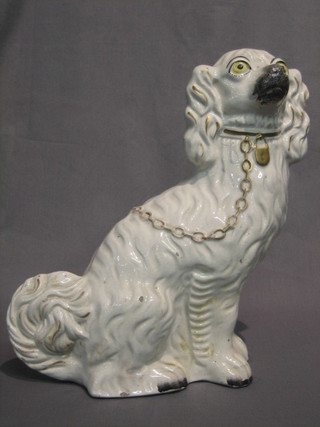 A 19th Century Staffordshire figure of a seated Spaniel 12"  (chip to base)