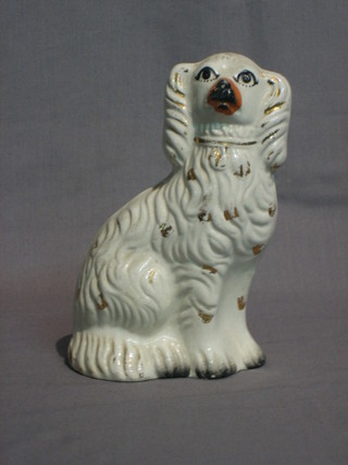A 19th Century Staffordshire figure of a seated Spaniel 7"