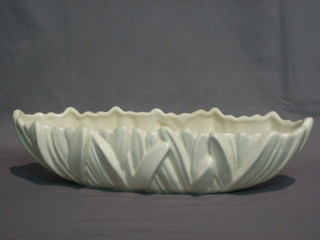 A Sylvac boat shaped white glazed vase with reed decoration  14"