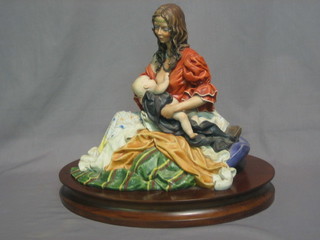 A  Capo  di  Monte  figure of a  seated  lady  breast  feeding  14"