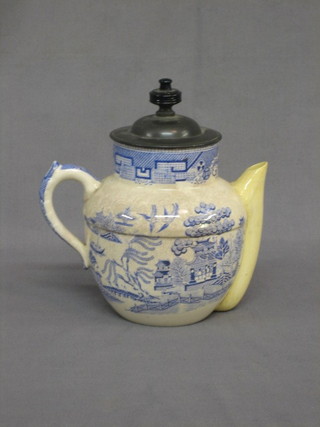 A  Doulton  Burslem Royal pattern self pouring teapot  no.  6327 (spout f and r)