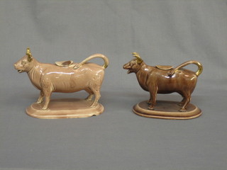 2 19th Century brown glazed cow creamers 8" and 6"