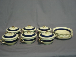 A  set  of 6 Wedgwood cream, gilt and blue  banded  soup  bowls and covers with matching saucers (all bowls cracked)