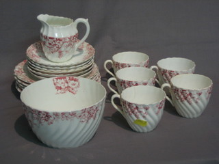 A 19 piece red and white pattern tea service