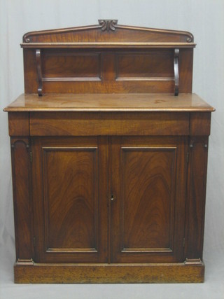 A  William  IV mahogany chiffonier with raised  back,  the  base fitted   1  long  drawer  above  a  double  cupboard   enclosed   by  panelled doors, raised on a platform base 39"
