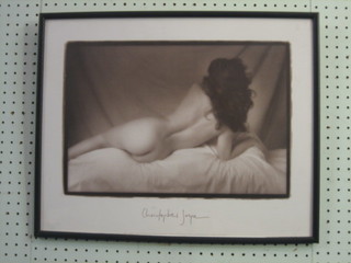4  black and white photographs of naked ladies and 1 other 15"  x 12"