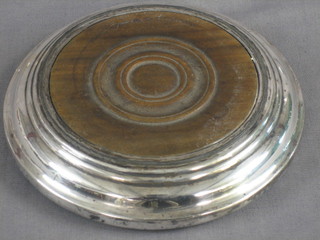 A circular silver plated teapot stand 5 1/2"