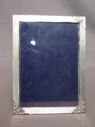 A silver plated easel photograph frame 10" x 7"