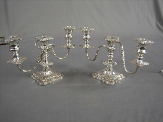 A pair of 3 light silver plated candelabrum