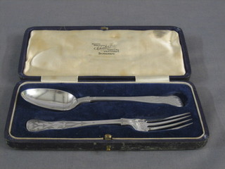 A Victorian engraved silver Old English pattern christening set comprising spoon and fork, London 1862, 3 ozs, cased