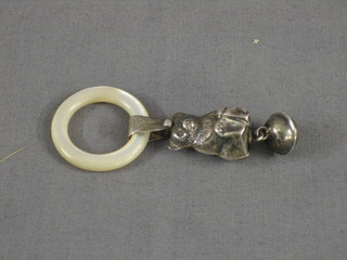 A silver rattle in the form of a bear with mother of pearl teething ring, Chester 1923, 3"