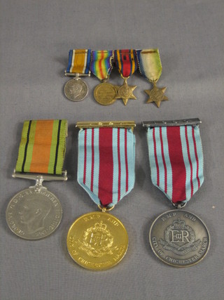 A Defence medal and 2 RNP and City of Chichester March medals 1990 and 1991, together with a group of 4 miniature medals comprising British War medal, Victory medal, Burma Star and Atlantic Star