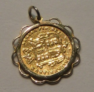 A Victorian 1871 shield back half sovereign contained in a pendant mount