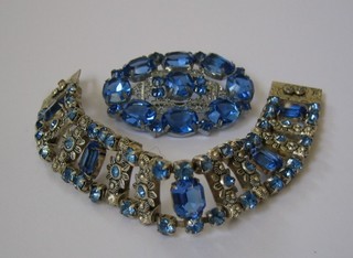 A suite of costume jewellery comprising bracelet and brooch set blue stones