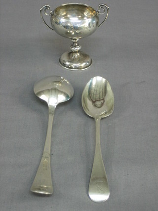 A Georgian silver Old English pattern spoon (r), a Victorian silver Old English pattern spoon, a silver twin handled trophy cup 3"