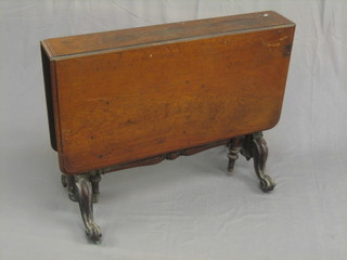 A Victorian mahogany oblong Sutherland table, raised on carved supports 36"