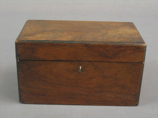 A Victorian walnut twin compartment tea caddy with hinged lid 9"