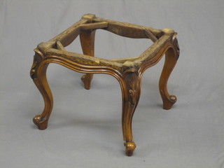 A Victorian square carved walnut show frame stool, raised on carved cabriole supports, 17" (requires upholstery)