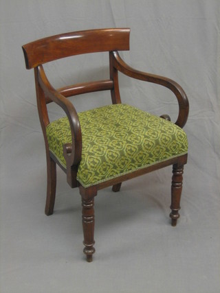 A 19th Century mahogany bar back desk/carver chair with plain mid rail and upholstered seat, on turned supports