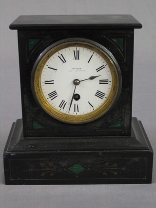 A Victorian French 8 day mantel clock with enamelled dial and Roman numerals contained in a black marble architectural case