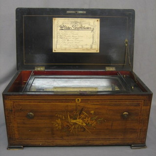 A 19th Century French cylinder music box playing 6 aires, the lid with cardboard card marked Fabrique De Geneve 1550 Elite Voix Celestes Etouffoirs en Acier Soit a Spiraux, contained in an inlaid rosewood case with hinged lid 21"