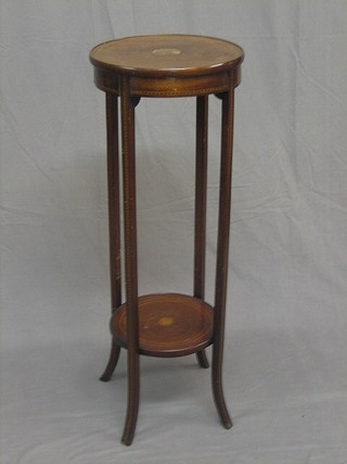 An Edwardian circular inlaid mahogany 2 tier jardiniere stand 13" (panel missing to the centre)
