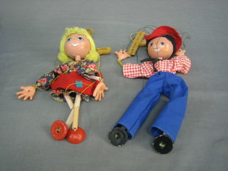 2 Pelham puppets - boy and girl and a Pelham puppet kit