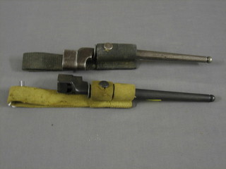 2 pig stick bayonets complete with scabbards