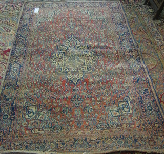 A fine quality 19th/20th Century red ground Persian rug with central medallion within multi-row borders 80" x 49"
