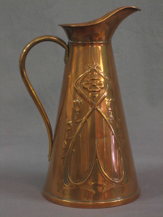 An Art Nouveau embossed pewter jug, the base marked J J & S 12"