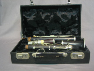 A wooden clarinet by Dore of Paris, cased