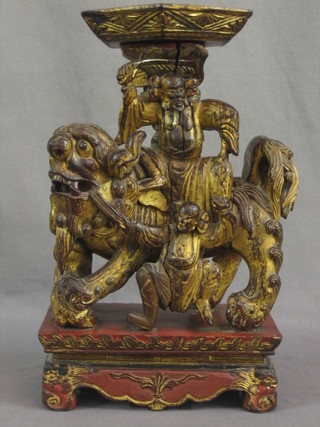 An Eastern carved gilt hardwood urn/lamp base in the form of 2 figures with Dog of Fo 14" high