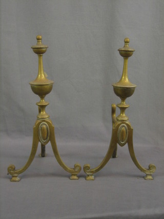 A pair of Adam style brass fire dogs with lidded urns 15"
