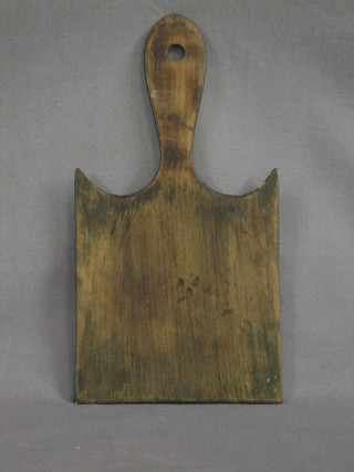 A small wooden baker's peel