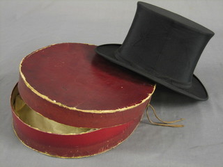 A gentleman's black opera hat by Dunn & Company (approx. size 7)