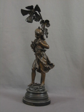 An Art Nouveau spelter figure of a standing girl 14" converted to a table lamp