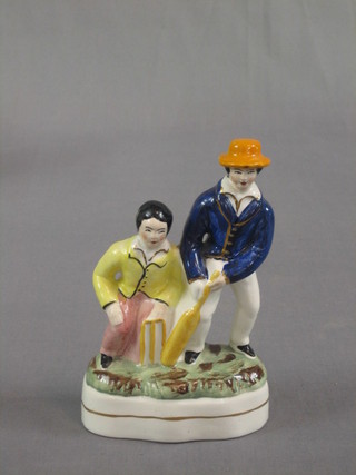 A Staffordshire figure group of batsman and wicket keeper 7"