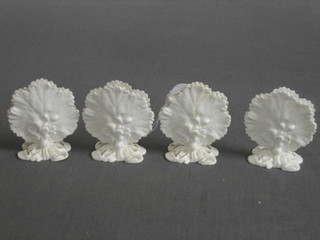 A set of 4 19th Century white glazed porcelain name place holders