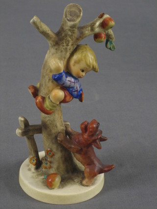 A  Goebel figure of a boy climbing a tree being pursued by a dog (branch f) 6"