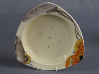 A Clarice Cliff Rhodanthe pattern circular pottery straining dish, the base with gilt Clarice Cliff Newport pottery mark, 9" (some crazing, cracked?)