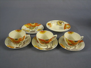 A Clarice Cliff Rhodanthe pattern circular breakfast bowl 6 1/2", a do. tea plate 6" together with 3 matching cups and saucers
